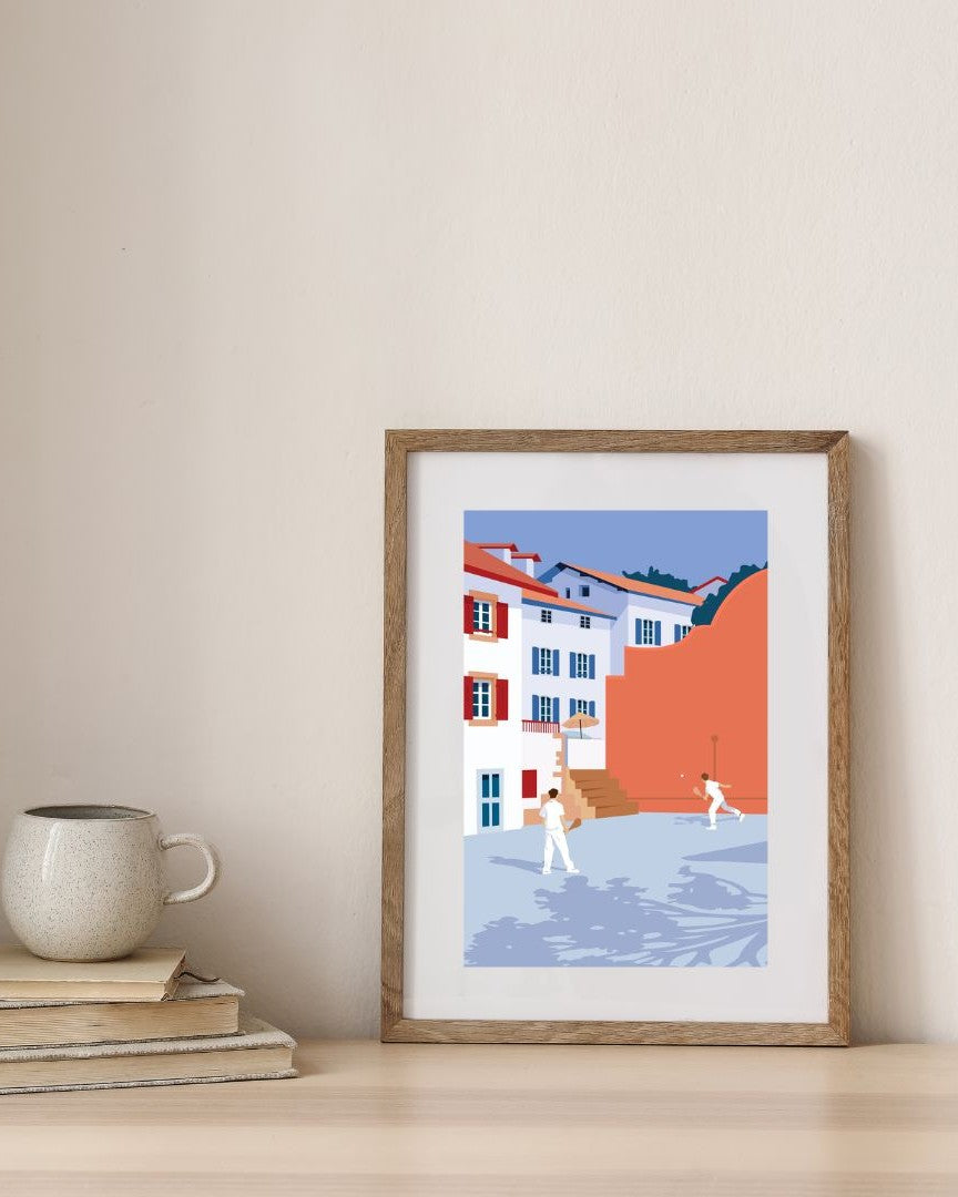 Affiche de la pala du Pays Basque dans un cadre en bois, en décoration murale minimaliste.