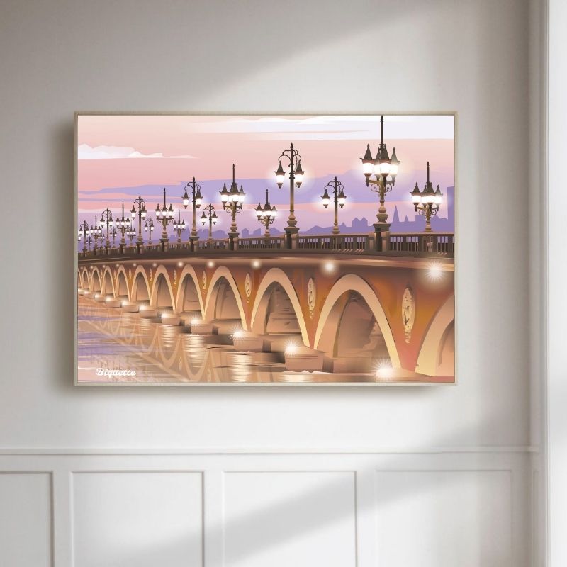 Maquette d'intérieur minimaliste montrant l'affiche du Pont de Pierre encadrée dans un cadre en bois, accrochée sur un mur blanc.